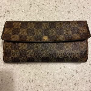 Louis Vuitton Sarah wallet in damier ebene canvas